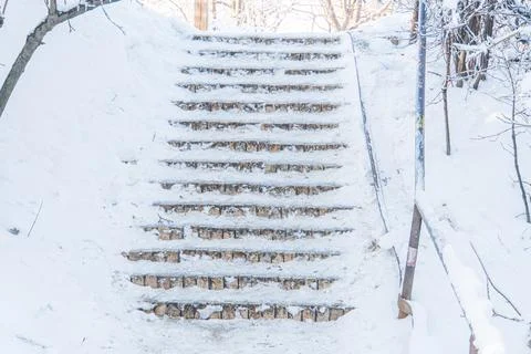 Snowy staircase in winter setting, central focus Alternating concretesimilar  Stock Photos