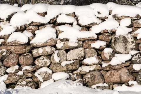 Snowy stone wall texture Stock Photos
