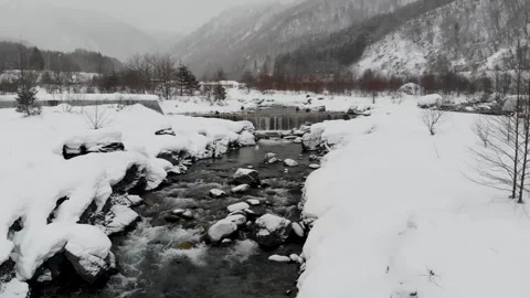 Snowy stream/ creek Stock Footage 246041319