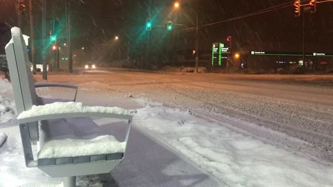 Snowy street intersection at night Stockbeeldmateriaal 86663017