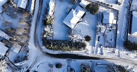 Snowy subdivision top down rotation - 5K Video stock 228003123
