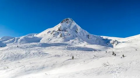 Snowy summit Stock Photos