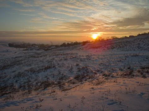 Snowy sunset Stock Photos