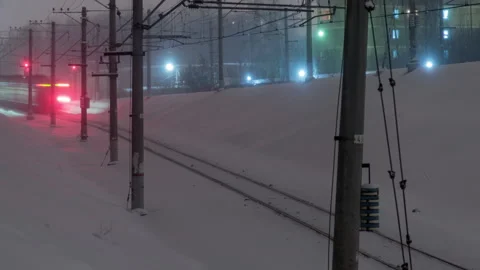 Snowy train tracks at night. Time-lapse. Stock Footage 323792303