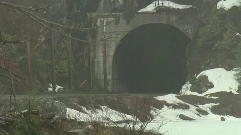 Snowy train tunnel no train longer Video stock 303934311