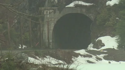 Snowy train tunnel no train Video stock 303934314