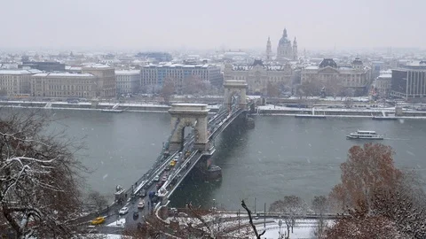 Snowy View of Budapest's Chain Bridge and Danube River Stock Footage 99840598