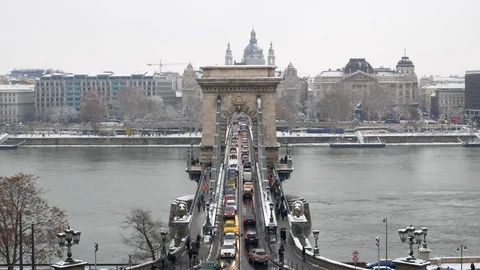 Snowy View of Budapest's Chain Bridge and Danube River Stock Footage 99872552