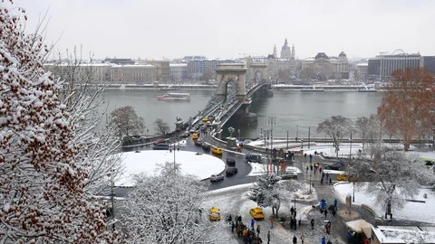 Snowy View of Budapest's Chain Bridge and Danube River Stock Footage 99872555