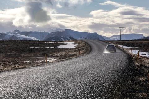 Snowy volcano landscape with dramatic clouds in Iceland Stock Photos