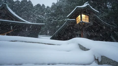 Snowy wall with lantern Low angle in Hakodate Gokoku Shrine Hakodate Japan 動画素材 325632288
