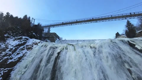 Snowy Waterfall Over Frozen River – Aerial Winter Nature Scene Stock Footage 322865261
