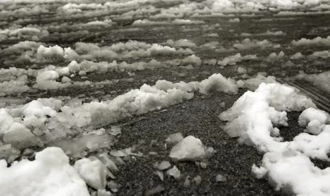Snowy wet soil Stock Photos