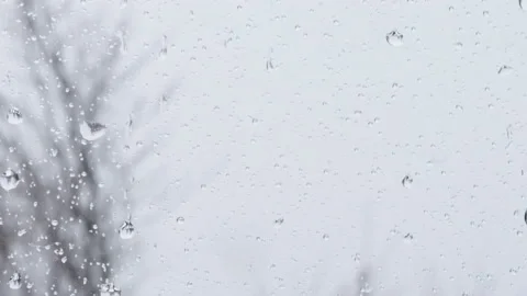 Snowy whether. car window with raindrops Stock Footage 168476964