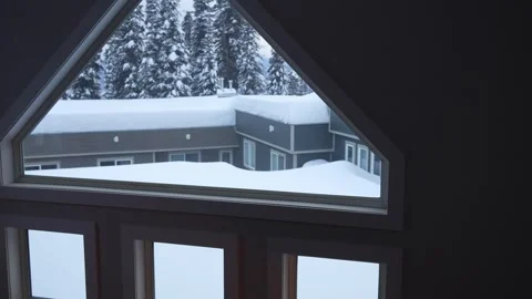 Snowy Winter Landscape through Attic Triangle Window Stock Footage 263184886