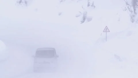Snowy winter road. Blizzard. Bad weather. Video stock 104797553