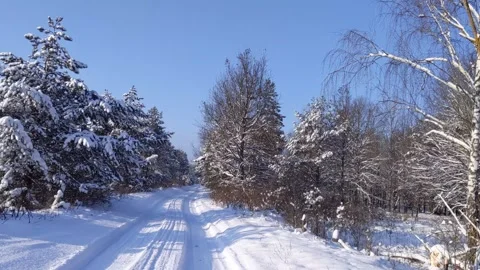 Snowy  winter road drive Stock Footage 337487387