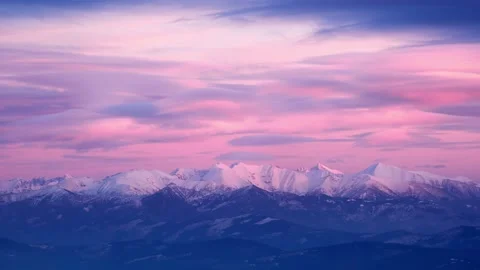 Snowy winter time-lapse of High Tatras, Slovakia at sunset.Colourful clouds in 스톡 동영상 228993923