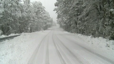 Snowying road Stock Footage 4080743