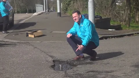 SNP has ignored pothole problem while wasting billions elsewhere – Findlay Video stock 332653221