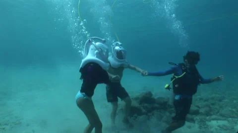 Snuba Divers Walking on the Ocean Floor Stock Footage 36370108