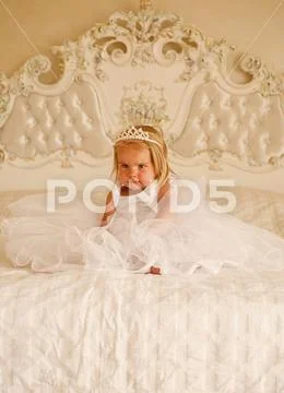 So good to be the queen. Little child with long blond hair. Little girl wear Stock Photos