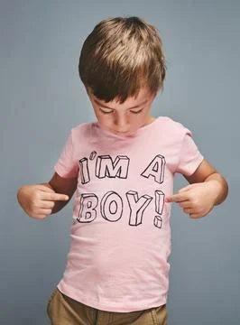 So much cuteness, I cant deal. Studio shot of a boy wearing a t shirt with Im a Stock Photos