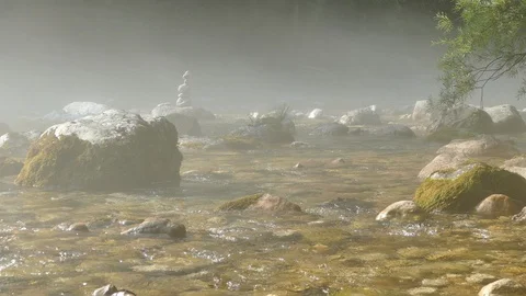 So?a river in morning fog with stack of rocks Stock Footage 130027842