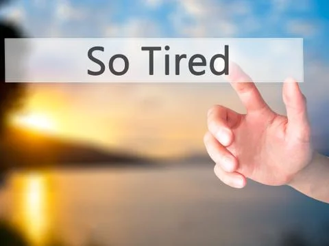 So Tired - Hand pressing a button on blurred background concept on visual scr Stock-Fotos