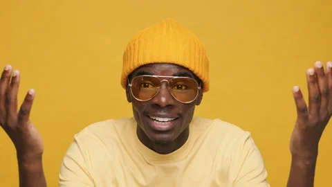 So what? What the hell? black young African American man raising his hands up Stock Footage 154004905