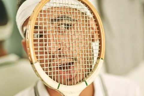 So this is why they call it squash. a young man pressing his face up against his Stock Photos