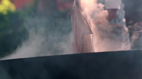 Soaking Fabric in Mordant Solution for Natural Dye Adhesion Stock Footage 336823287