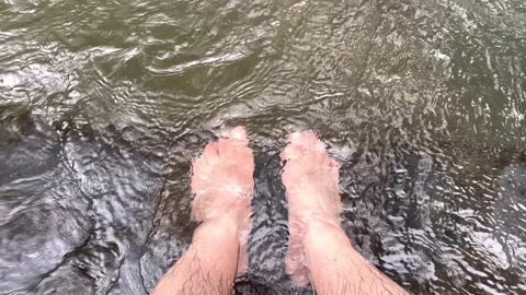 Soaking feet stream2 Stock Footage 323242548