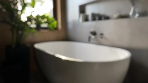 Soaking in modern bathroom 스톡 동영상 342335456