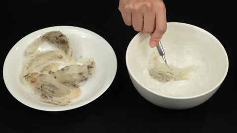 Soaking Raw Bird Nest In Water Bowl For Cleaning Stock Footage 339369930