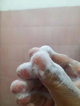 Soap and hand Stock Photos