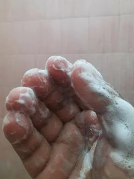 Soap and hand Stock Photos