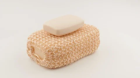Soap and sponge on a white background. Rotation. 스톡 동영상 129694253