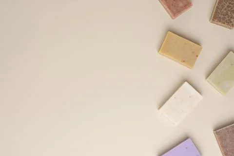 Soap on beige background. Flat lay, copy space. Stock Photos
