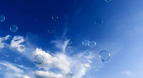 Soap bubble on blue background Stock Photos