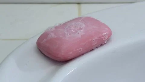 Soap Bubble Ceramic Tile White Tile Pink wash mirror shape.JPG Stock Photos