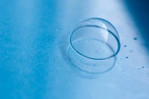 Soap bubble close up. abstract blue water background 스톡 사진