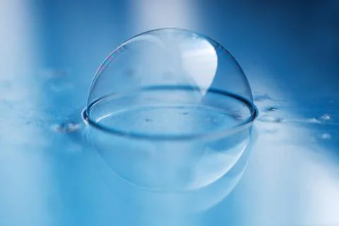 Soap bubble close up. abstract blue water background 스톡 사진