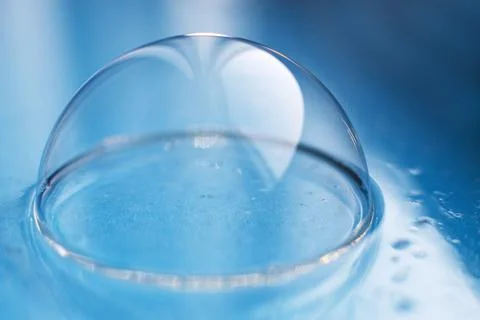 Soap bubble close up. abstract blue water background 스톡 사진