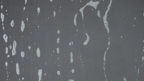 Soap bubble foam flow down on crystal Stock Footage 109560357