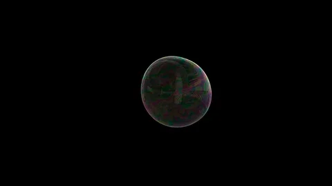 Soap bubble inflates and flies over dark black screen Stock Footage 121811861