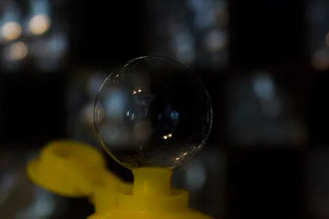 Soap bubble from neck of bottle, soft focus Stock-Fotos