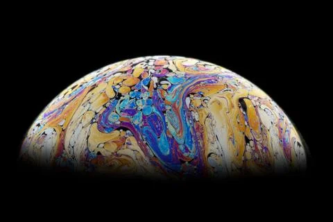 Soap bubble. Rainbow colors. Macro photo. Stock Photos