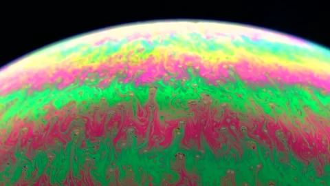 A soap bubble that shimmers in different colors. 스톡 동영상 234113153