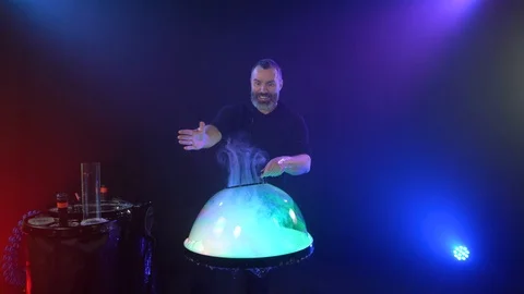 Soap bubble show a man lets smoke out of a bubble Video stock 125691170